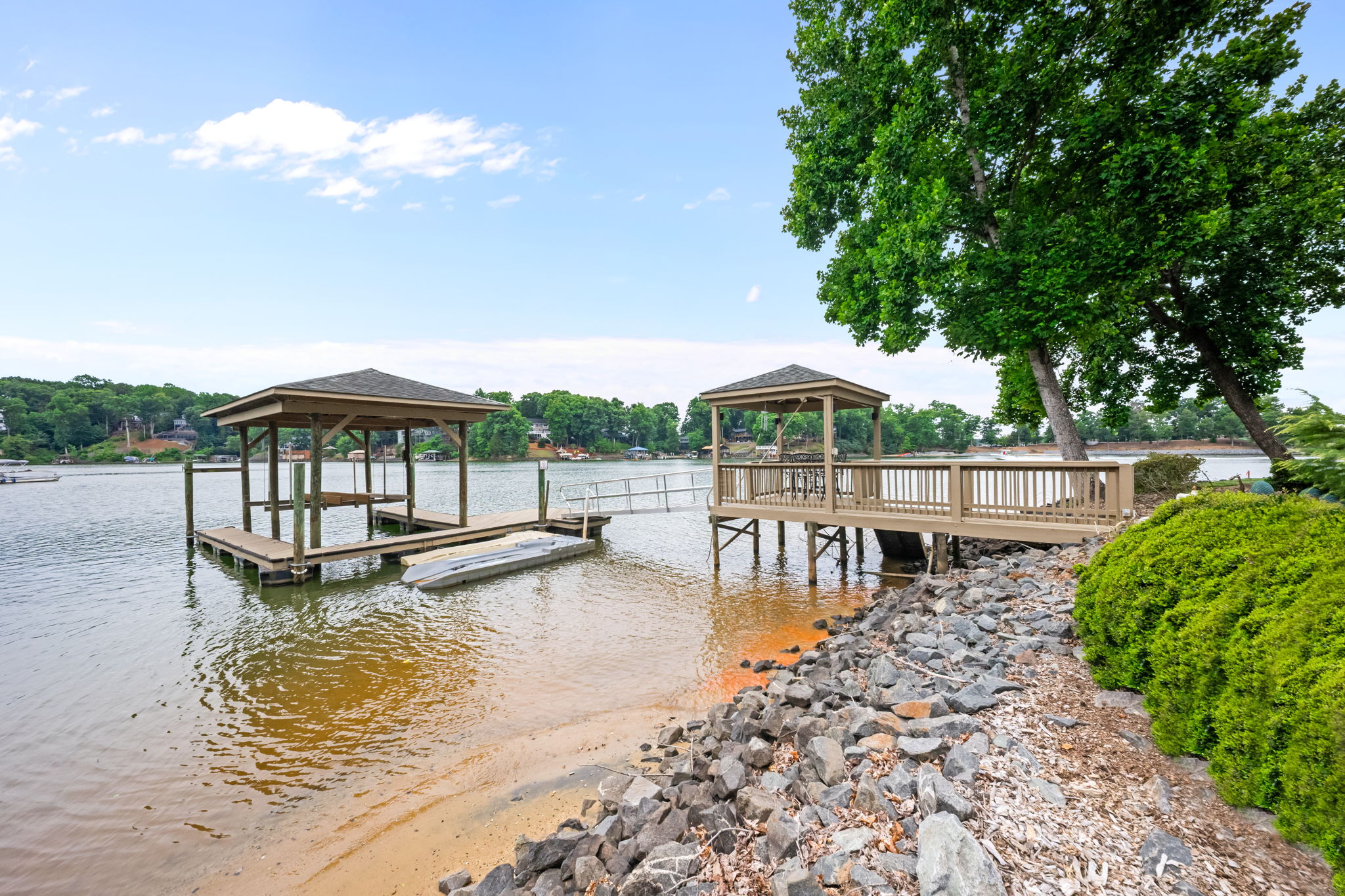Private covered dock with boat slips and floating dock on Lake Wylie